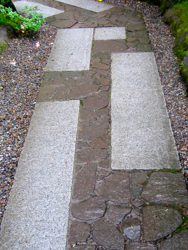 Here is a mix of the stone and the rectangular blocks laid out in a carefully crafted formal path. The blend of textures heightens your awareness of where you walk, which is exactly the point. 